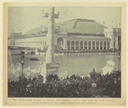 The Manufactures Building on Chicago Day, October 9, 1893, as seen from the south fountain. The picture shows the massing of the crowds on every foot of open ground, and the multitude on the great roof