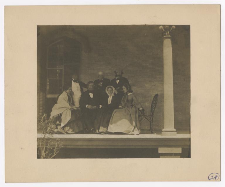 Four Men and Three Women on Porch