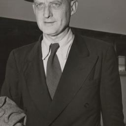 Reinhold Niebuhr wearing hat