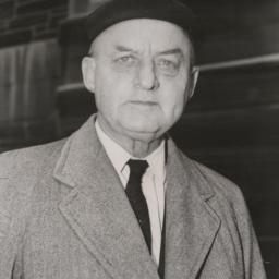 Reinhold Niebuhr wearing bl...