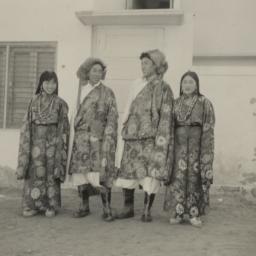 Four Tibetans in traditiona...