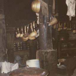 Kitchen with hanging pots i...