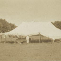 Big White Tent in Field