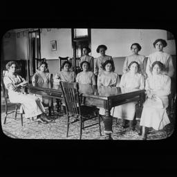Group of Women around a Lon...