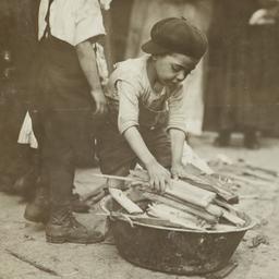 Little Boy with Scrap Wood