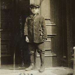 Boy Standing at Entrance to...