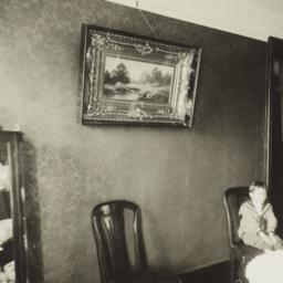 Woman with Boy in Dining Room