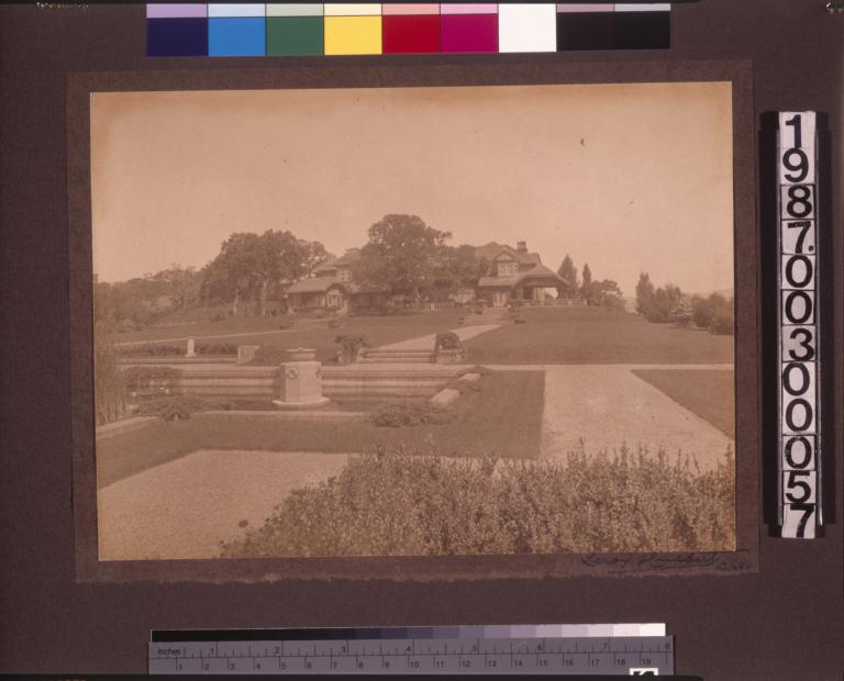 Formal garden with south (rear) elevation of the main residence in the distance.